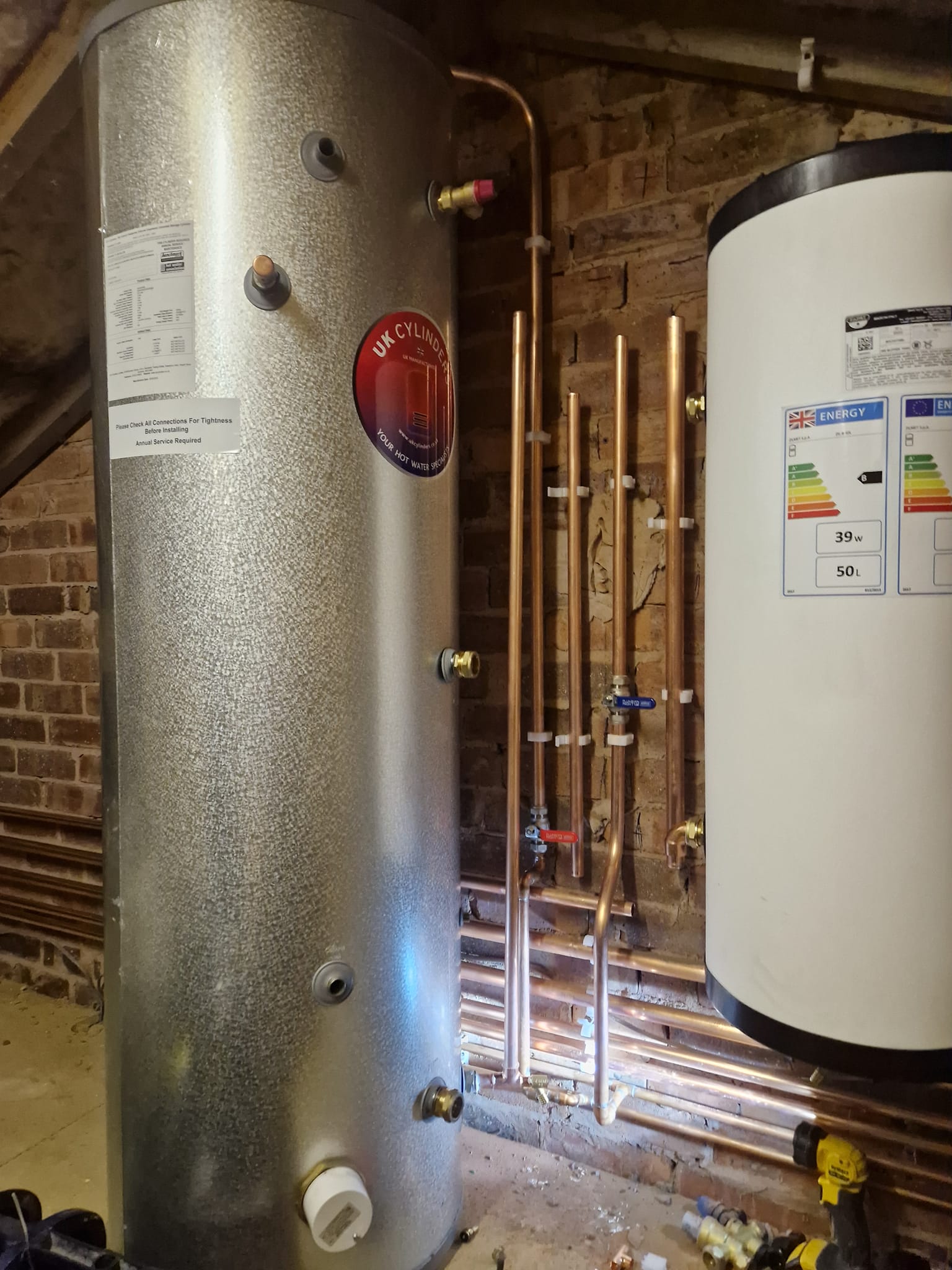 Plumbing in bathroom cabinet setup