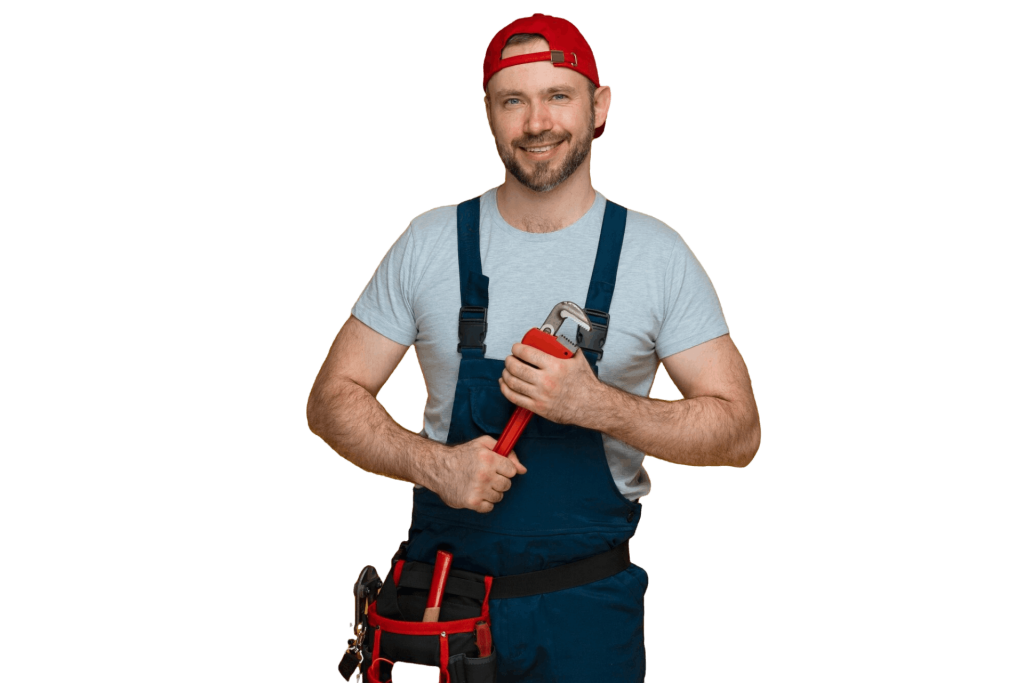 Smiling plumber holding a wrench